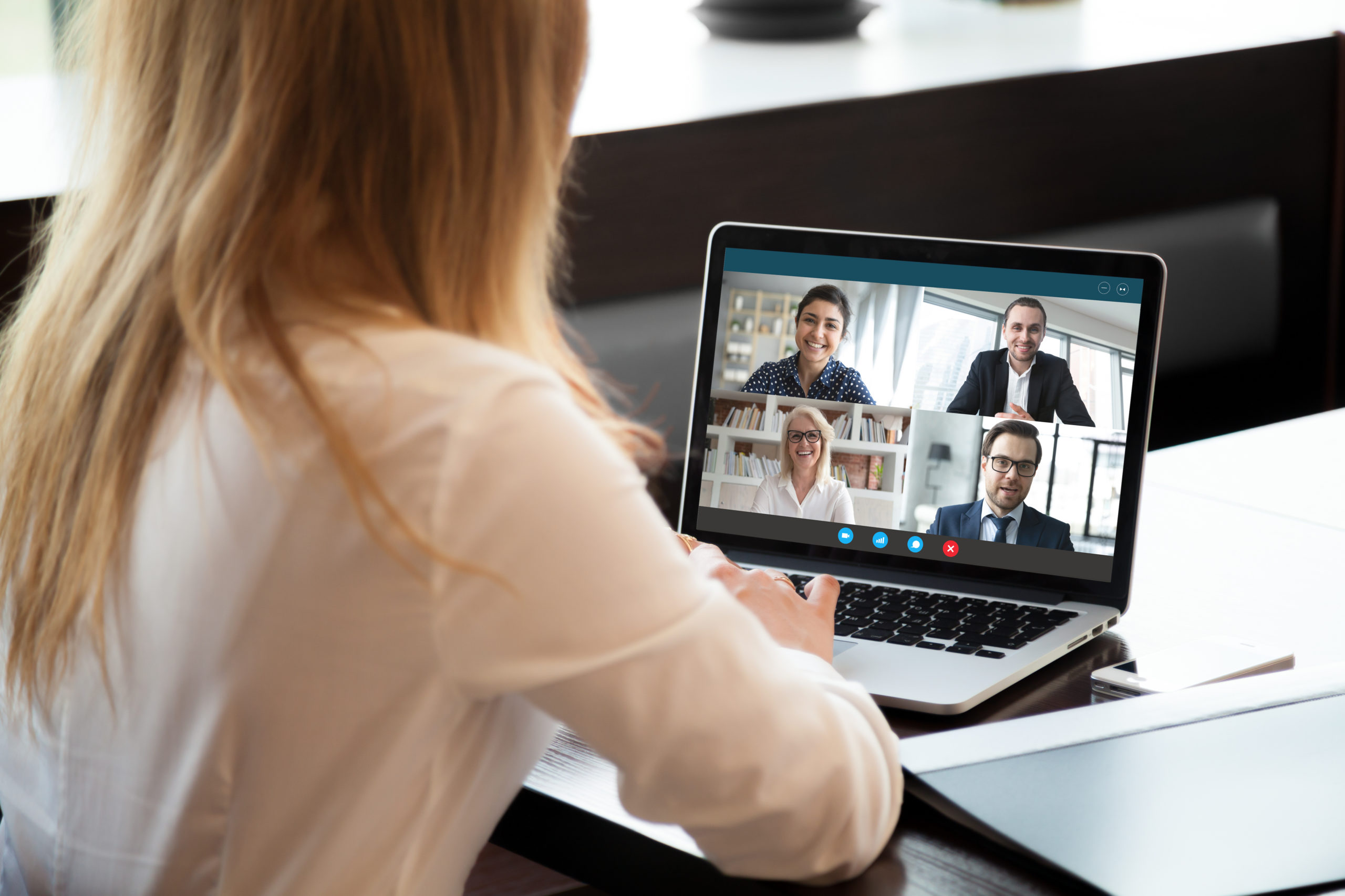 Woman video conferencing in a family law meeting